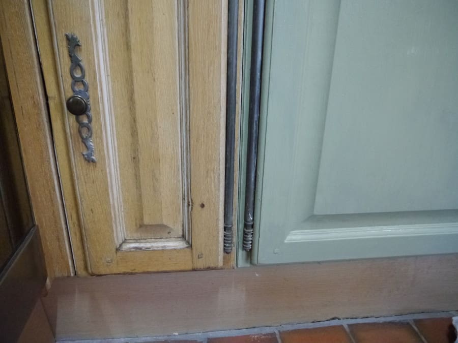 here you can see before and after painting - as you can see where the varnish had come away the wood had started to blacken from splashes of water