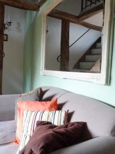 wall painted with Earthborn clay paint and mirror frame painted with Annie Sloane chalk paint