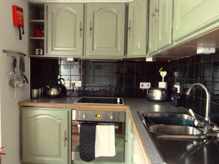 the newly painted cupboards look clean and bright